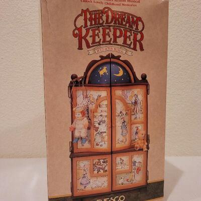 Lot 60: The Dream Keeper Multi Action Musical Christmas Deco