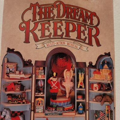 Lot 60: The Dream Keeper Multi Action Musical Christmas Deco