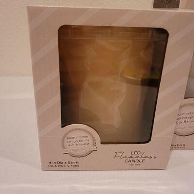 Lot 57: (2) New LED Candles and Hallmark Ornaments