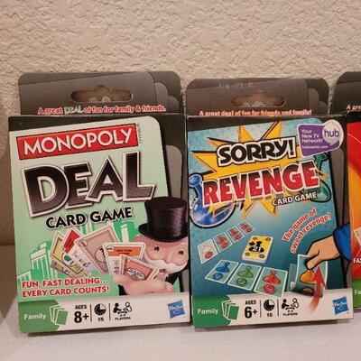 Lot 73: Assortment of New Card Games (4) + Elf Coloring Book