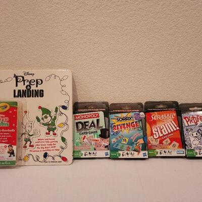 Lot 73: Assortment of New Card Games (4) + Elf Coloring Book
