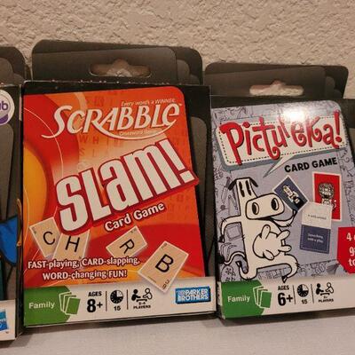 Lot 73: Assortment of New Card Games (4) + Elf Coloring Book