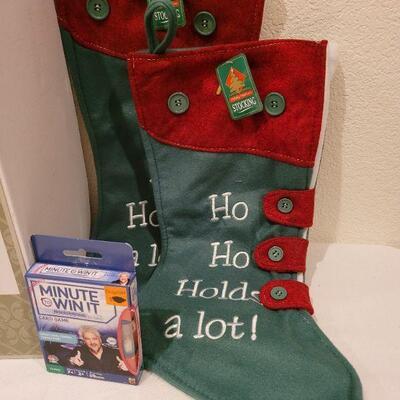 Lot 77: (2) New HO HO HO Christmas Stockings + Santa NEW LED Display