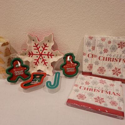 Lot 83: Assorted Baking NEW Christmas Dough Cutters, Napkins and Snowflake Dish