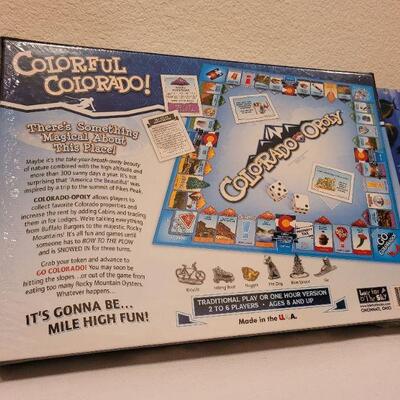 Lot 86: New COLORADO-OPOLY and HALLMARK Coral Reef Puzzle