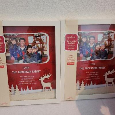 Lot 102: NEW Santa Hats (3), Santa Animated Plushie, and (2) Picture Frames