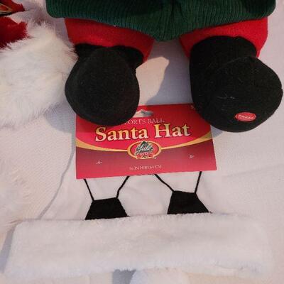 Lot 102: NEW Santa Hats (3), Santa Animated Plushie, and (2) Picture Frames