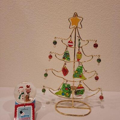 Lot 109: NEW Candle Light Glass and Metal Tree and Snowman Globe