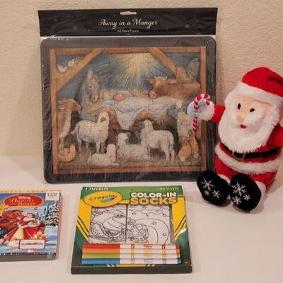 Lot 117: NEW Gift Lot  Activity Pad, Puzzle, Crayola Color Socks and Animated Santa 