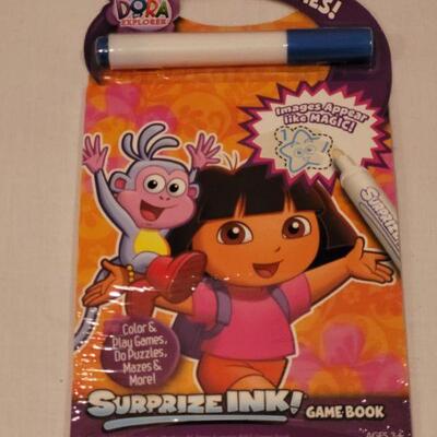 Lot 124: NEW Dora the Explore Sets (2) and Activity Pad