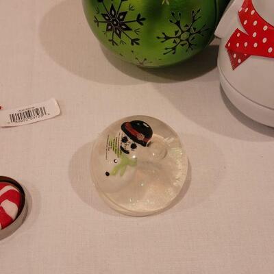 Lot 130: NEW Holiday Cheer Lot - Gingerbread Kits (3), Gingerbread Tin, Christmas Movie, Roly Poly Snowman Tin and (4) Fillable Ornaments 