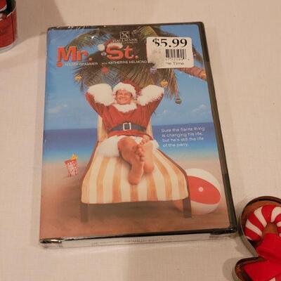 Lot 130: NEW Holiday Cheer Lot - Gingerbread Kits (3), Gingerbread Tin, Christmas Movie, Roly Poly Snowman Tin and (4) Fillable Ornaments 