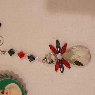 Lot 134: NEW Blowing Snow Globe Snowman and Ornaments 