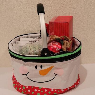 Lot 142: NEW Hallmark Snowman Collapsible Basket,  Candle, (3) Holiday Plates, Macy's Christmas Tree Salt & Pepper, Handpainted...