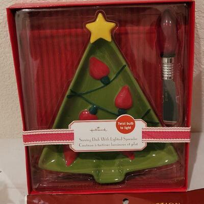 Lot 152: NEW Cookie Cutters, Tablecloth, Bowl & Plates with Spreaders, Snowman Tin and Holiday Candle