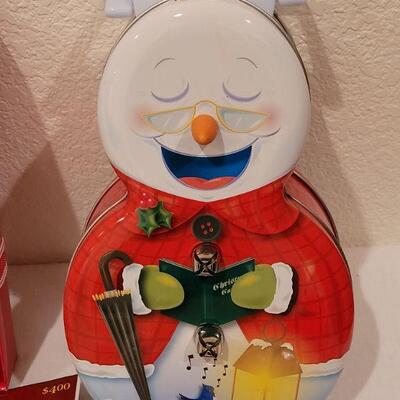 Lot 152: NEW Cookie Cutters, Tablecloth, Bowl & Plates with Spreaders, Snowman Tin and Holiday Candle