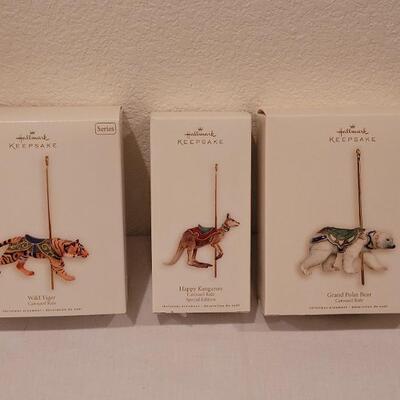 Lot 153: New Hallmark Carousel Ornaments 