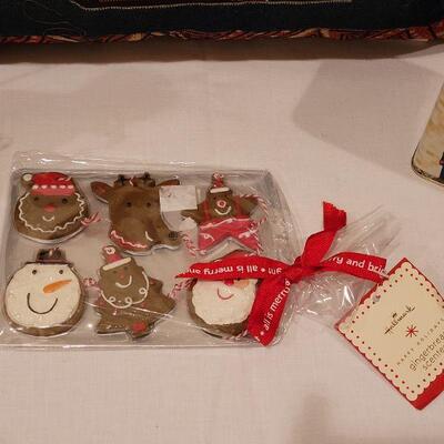 Lot 154: New Sarah Burch Pillow, Toy Shop Tin, Gingerbread Magnets and Jim Shores Cat with Garland