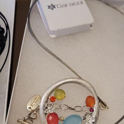 Lot 162: (2) New Necklaces (1 long and 1 short)