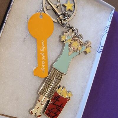 Lot 163: New Hallmark Ribbon Necklace and "She thanked her lucky stars" Keychain