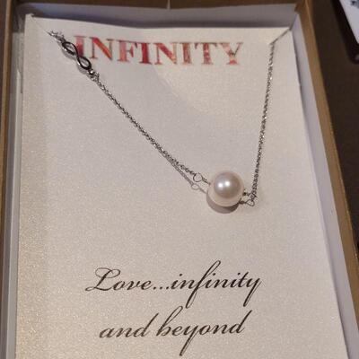 Lot 166: NEW Infinity Necklace and 2 NEW Rings (one with Smoky Quartz Stone)
