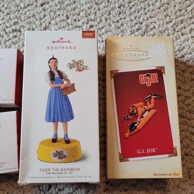 Lot 174: Hallmark NEW KEEPSAKE POWER CORD + Hallmark Christmas Ornaments feat. Wizard of Oz and G.I. JOE 