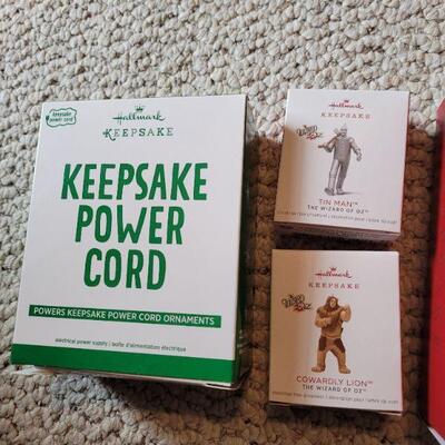 Lot 174: Hallmark NEW KEEPSAKE POWER CORD + Hallmark Christmas Ornaments feat. Wizard of Oz and G.I. JOE 