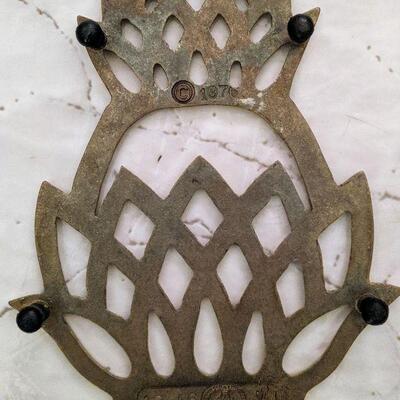 Pair of Virginia Metalcrafters Trivets Solid Brass Dogwood and Hospitality Pineapple