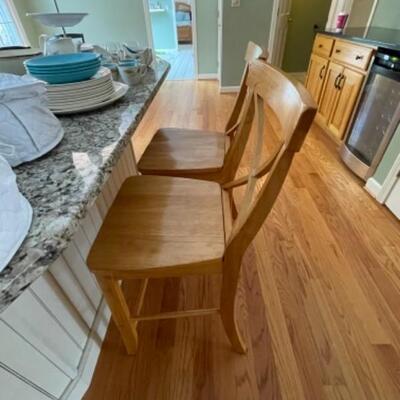 Two oak wood kitchen stools