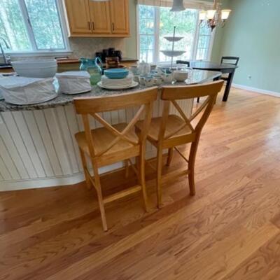 Two oak wood kitchen stools