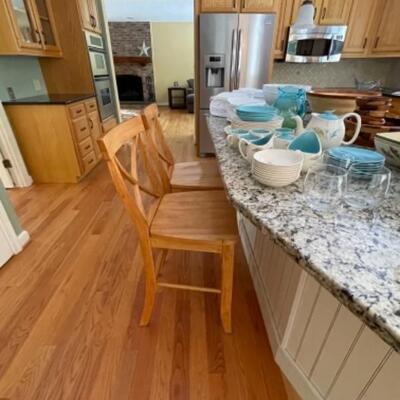 Two oak wood kitchen stools