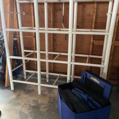 White storage unit with like new blue storage bins that fit into the cubby holes