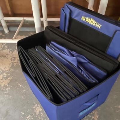 White storage unit with like new blue storage bins that fit into the cubby holes