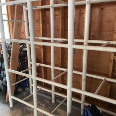 White storage unit with like new blue storage bins that fit into the cubby holes