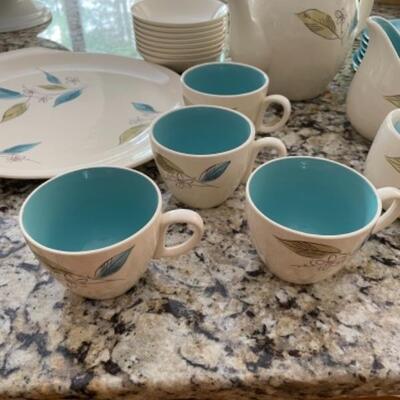 Set of dinner plates, bowls, tea/coffee set, salt and pepper shaker and platter