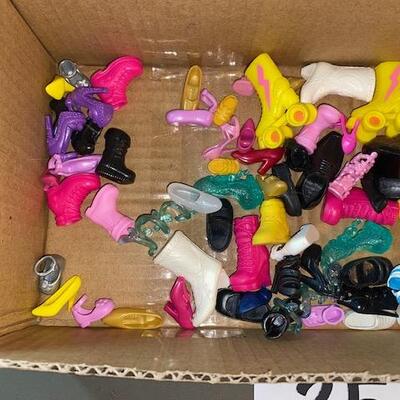 35-  Barbie and other doll shoes 