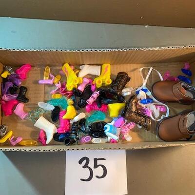 35-  Barbie and other doll shoes 