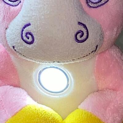 Lot 111- Unicorn flashlight friends
