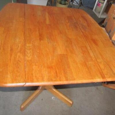 LOT 84  DROP LEAF WOODEN DINING TABLE