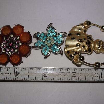 Trio of Misc. Brooches, Clown & Flower Pins