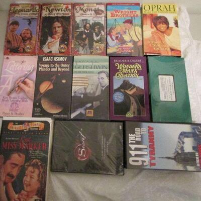 #42 VHS tapes and 1 DVD