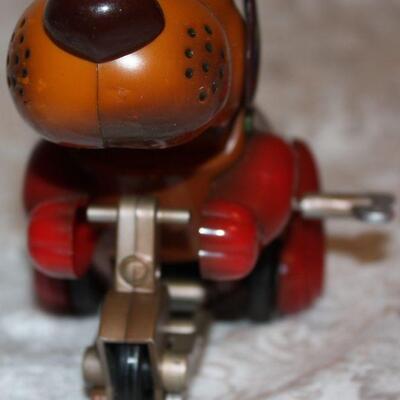 #73 wind up toy and friction car