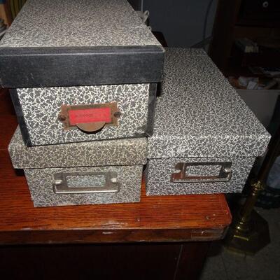 3 old file boxes