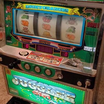 Lot 35:  Juggler girl slot machine