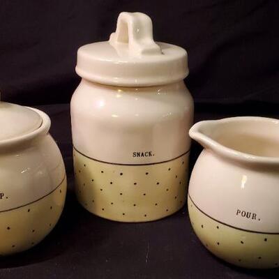 Lot 41: Ceramic tea pots, copper tea kettle, snack set, pitcher, Jack Daniels tin, and more.