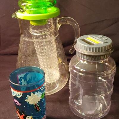 Lot 41: Ceramic tea pots, copper tea kettle, snack set, pitcher, Jack Daniels tin, and more.