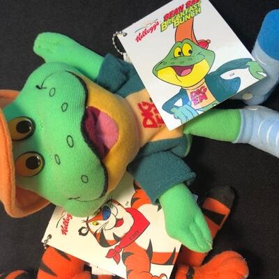 8 Vintage Food Themed Stuffed Animals - Mr Peanut, Tony The Tiger, Fruit Loop Toucan, Smacks Dig em, 3 smaller Pillsbury Doughboys, and 1...