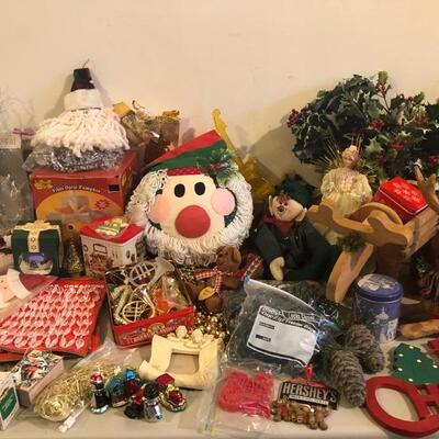 2 Full tables of Christmas Decorations, ornaments, lights and more