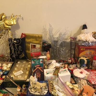 2 Full tables of Christmas Decorations, ornaments, lights and more