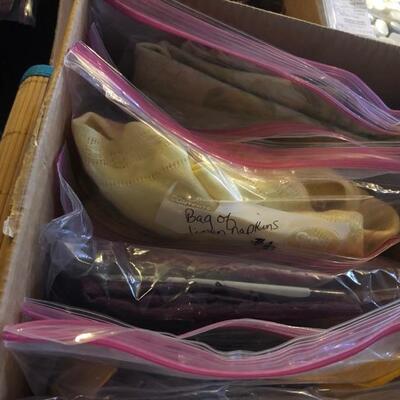 Box of variety of Linens, Tablecloth, and Bamboo Table Runner